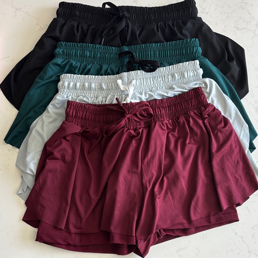 Real Essentials 4 Pack: Woman’s Flowy Dry Fit Running Workout Shorts - Medium